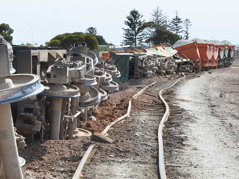 Photo of train derailment with bent tracks